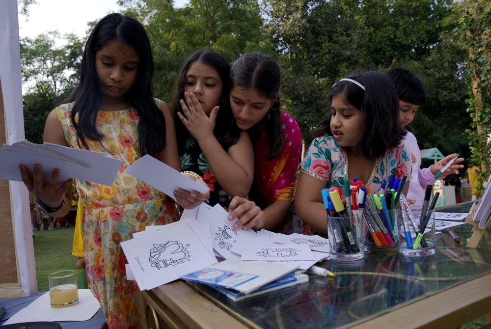 Kids doodling together at a workshop